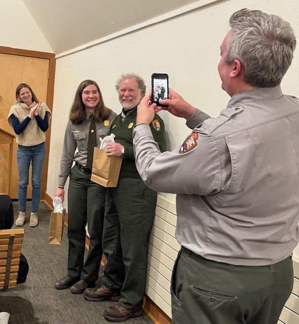 Rangers Rachel Overpeck and Bruce Rothweiler receiving the 2025 Most Inspirational Park Employees award